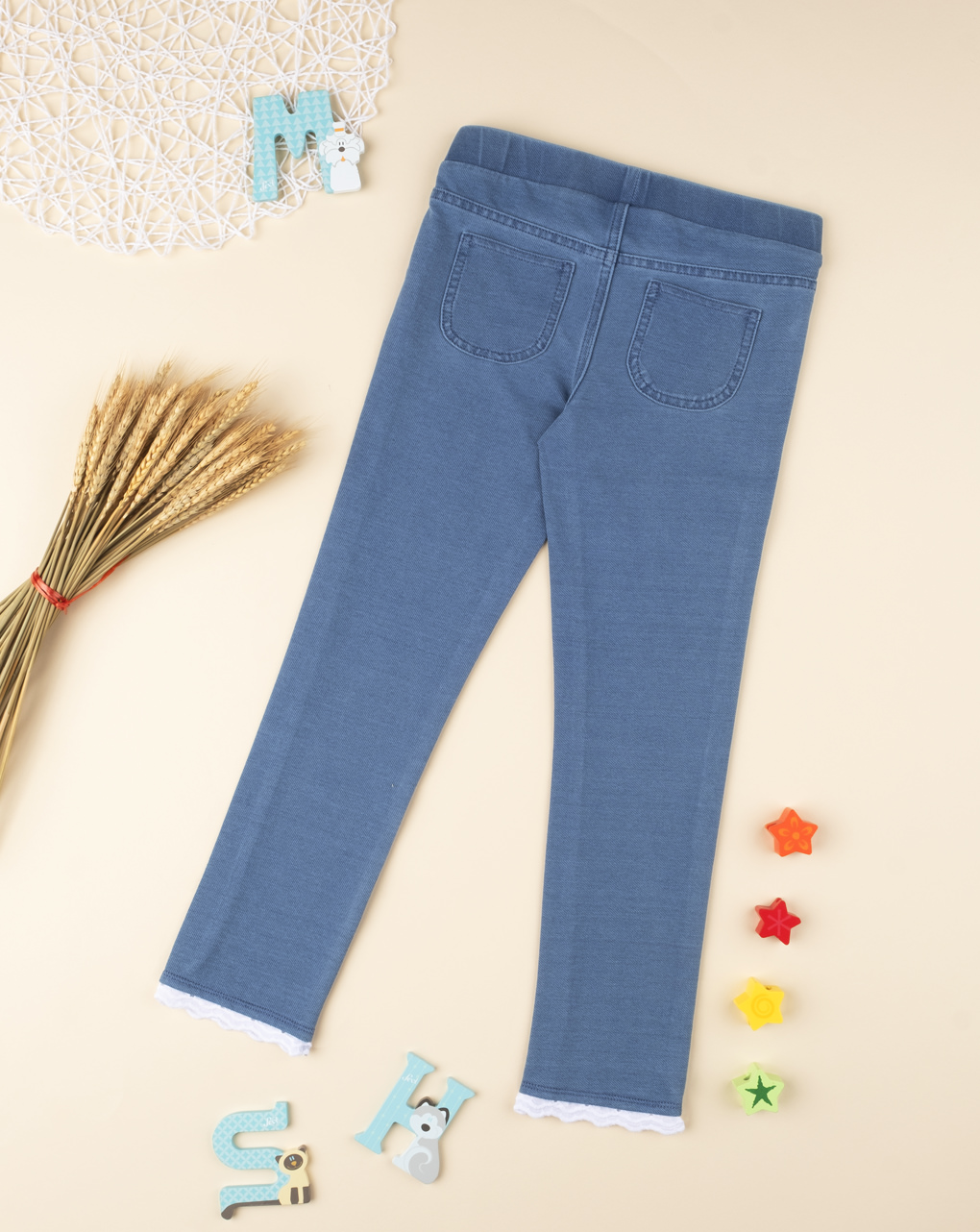 Calça jeans de menina azul com laços - Prénatal