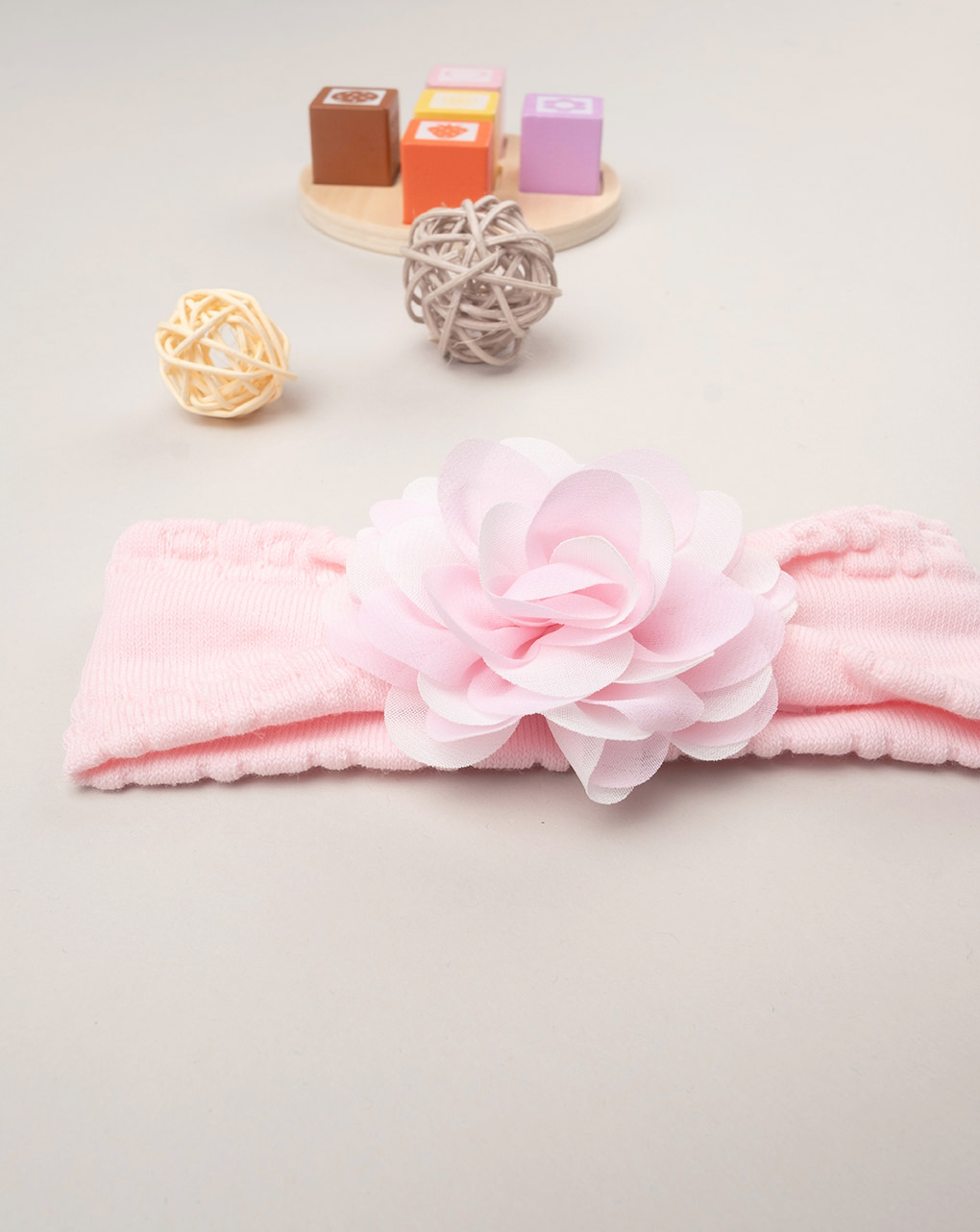 Bandolete rosa bebé com flor aplicada - Prénatal